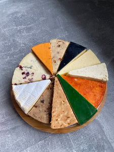 Cheese Wheel on bamboo board